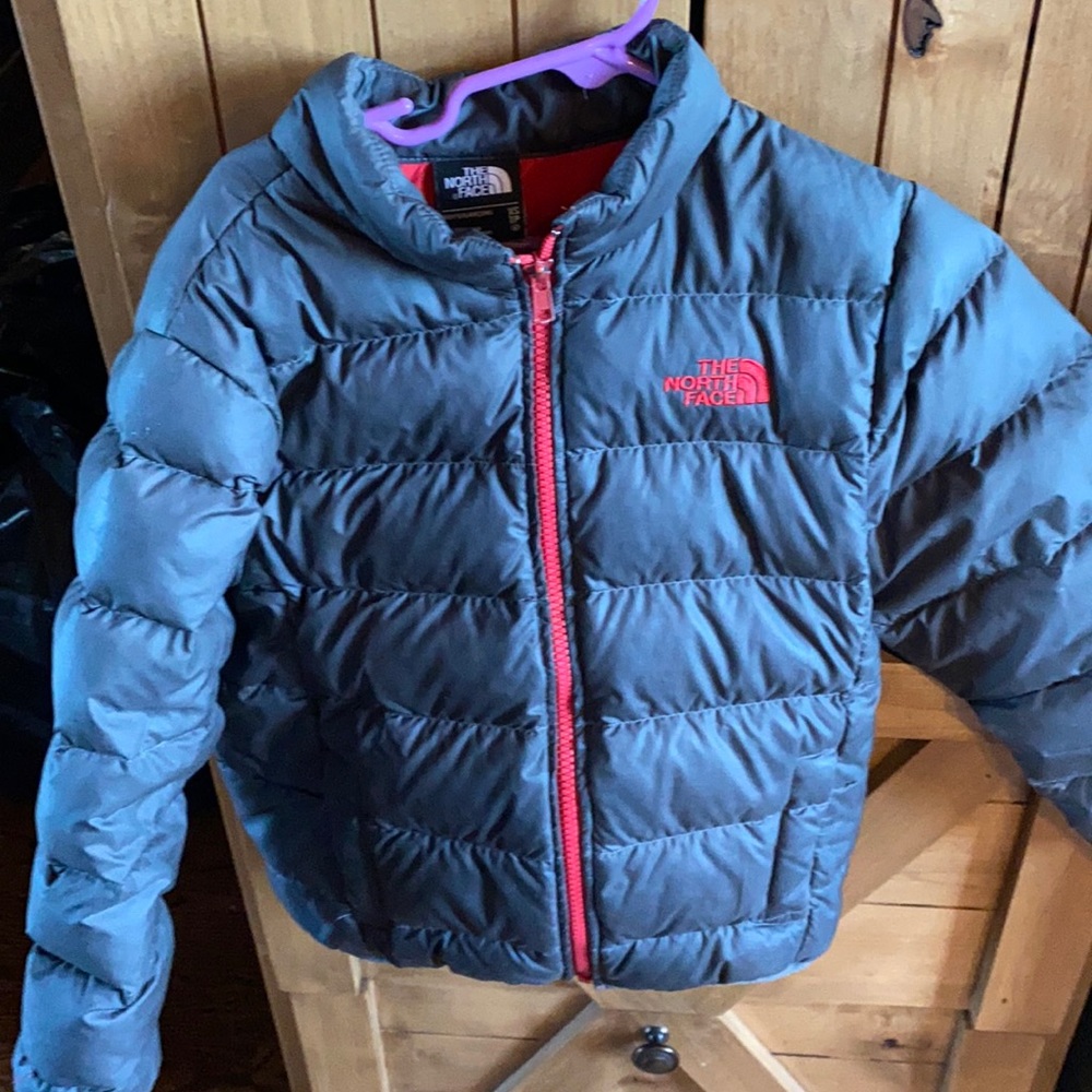 Boys, black with red zipper north face puffer jacket. In good used condition